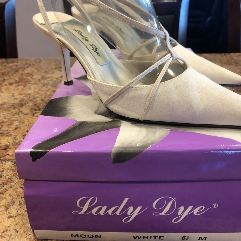 Ivory dyeable ankle strap heels.